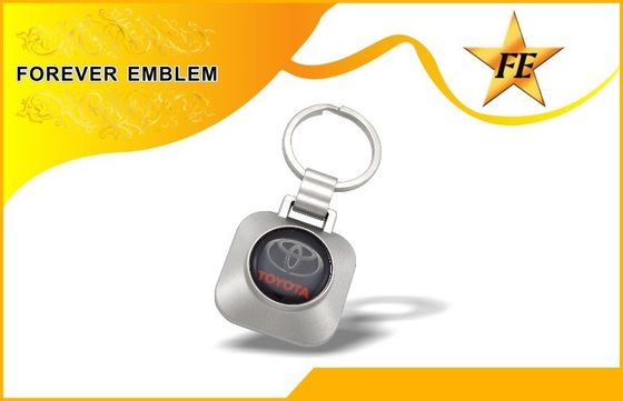 Het Muntstuksleutelring en Muntstukhouder Keychain van het supermarktkarretje met Douaneembleem